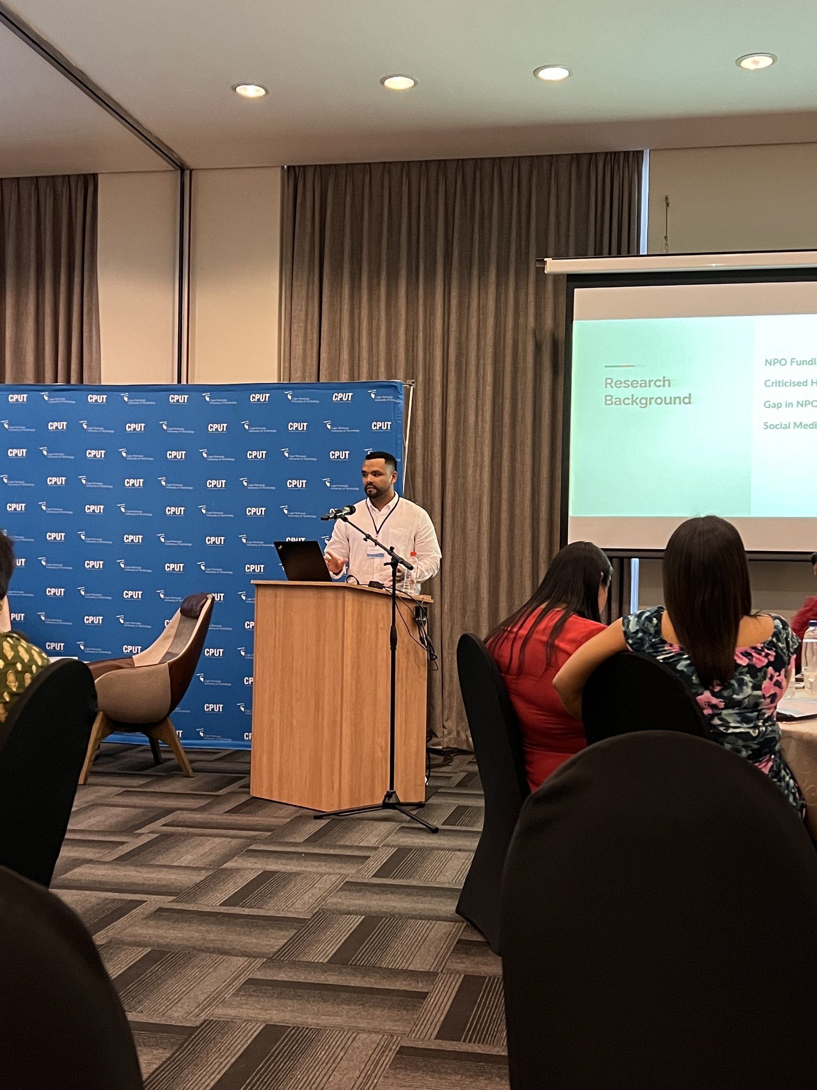 Shaun Cedric Thomas presenting research at a CPUT marketing conference in Cape Town